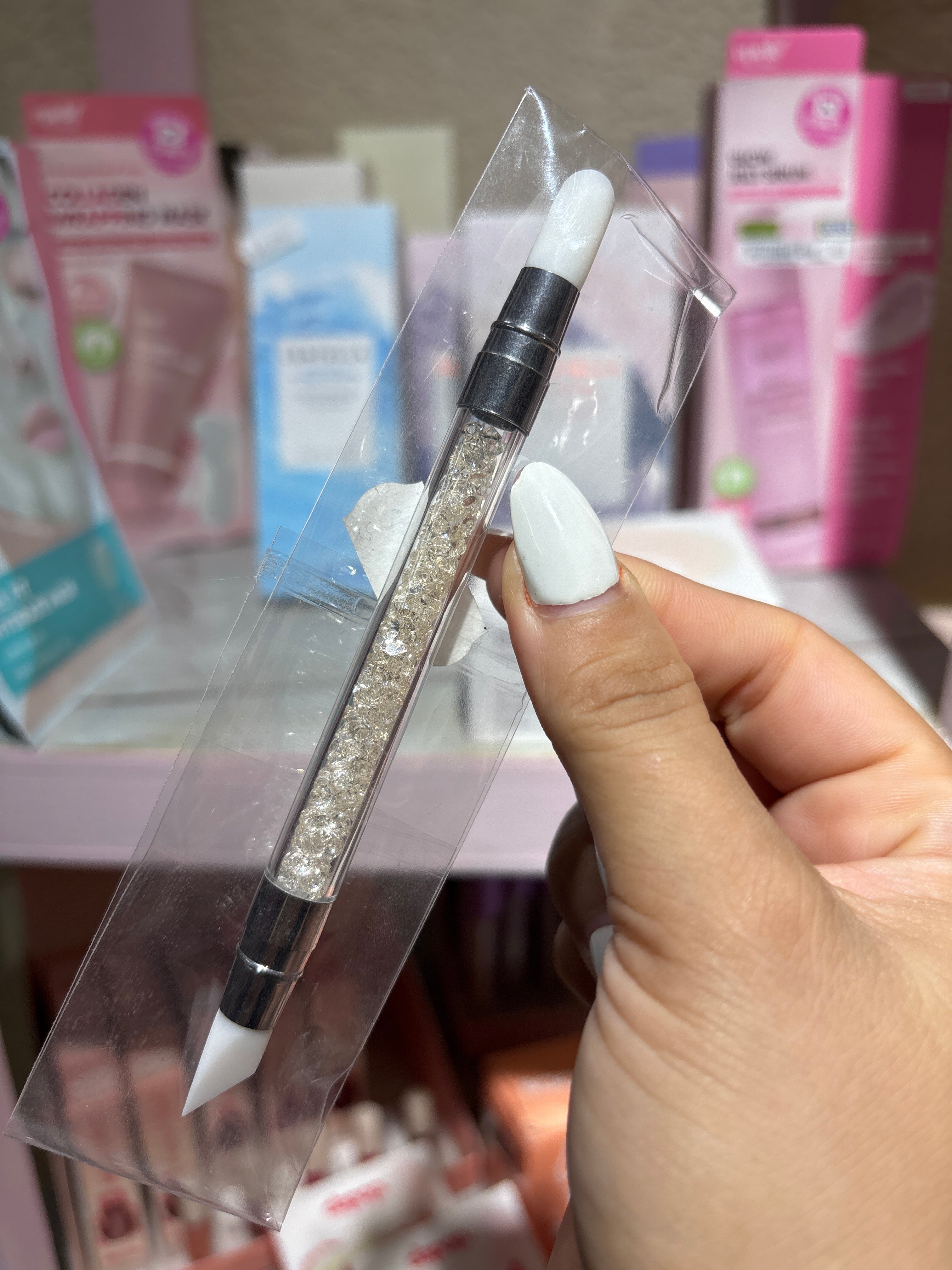 aplicador con punta de goma/ uñas